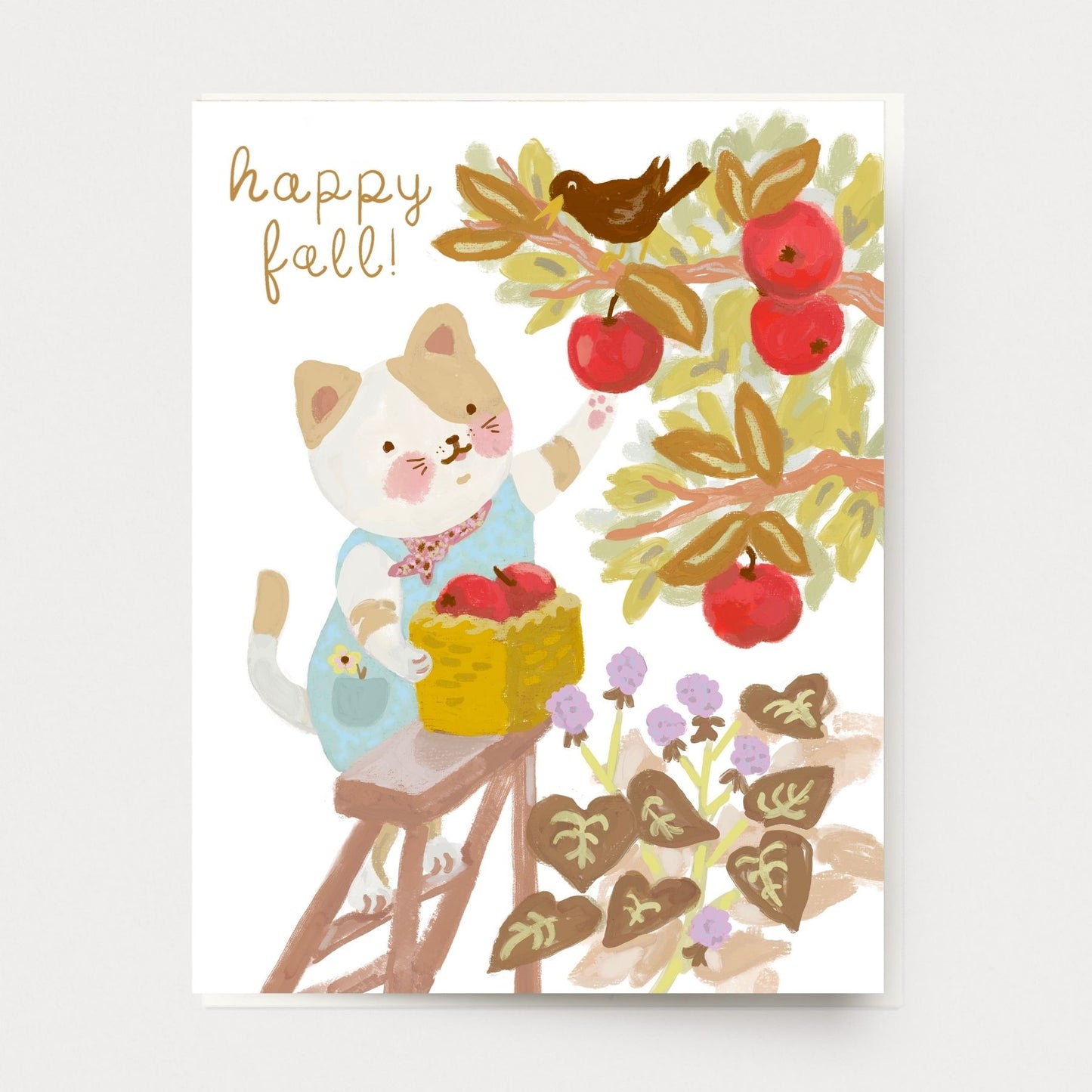 A fall card of a cute cat picking apples with a raven and blackberries, hand illustrated in California and ethically printed in the USA